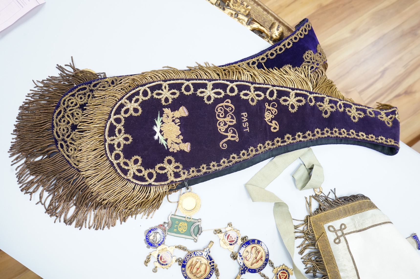 A group of Masonic medals, ‘jewels’ many enamelled and sashes, together with an early 19th century certificate